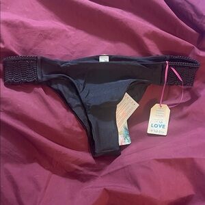 Luli Fama Black Bikini Bottom with Crochet Details